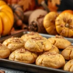 Soft and chewy Jumbo Pumpkin Cinnamon Cookies on a fall-themed platter.